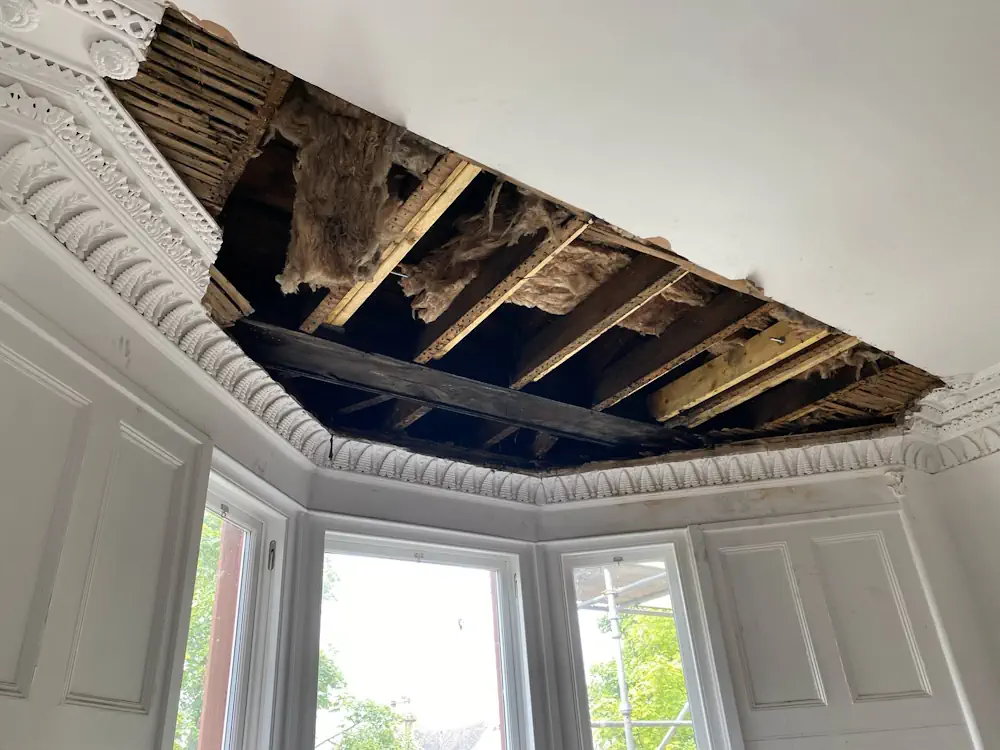 Heavily damaged plaster ceiling