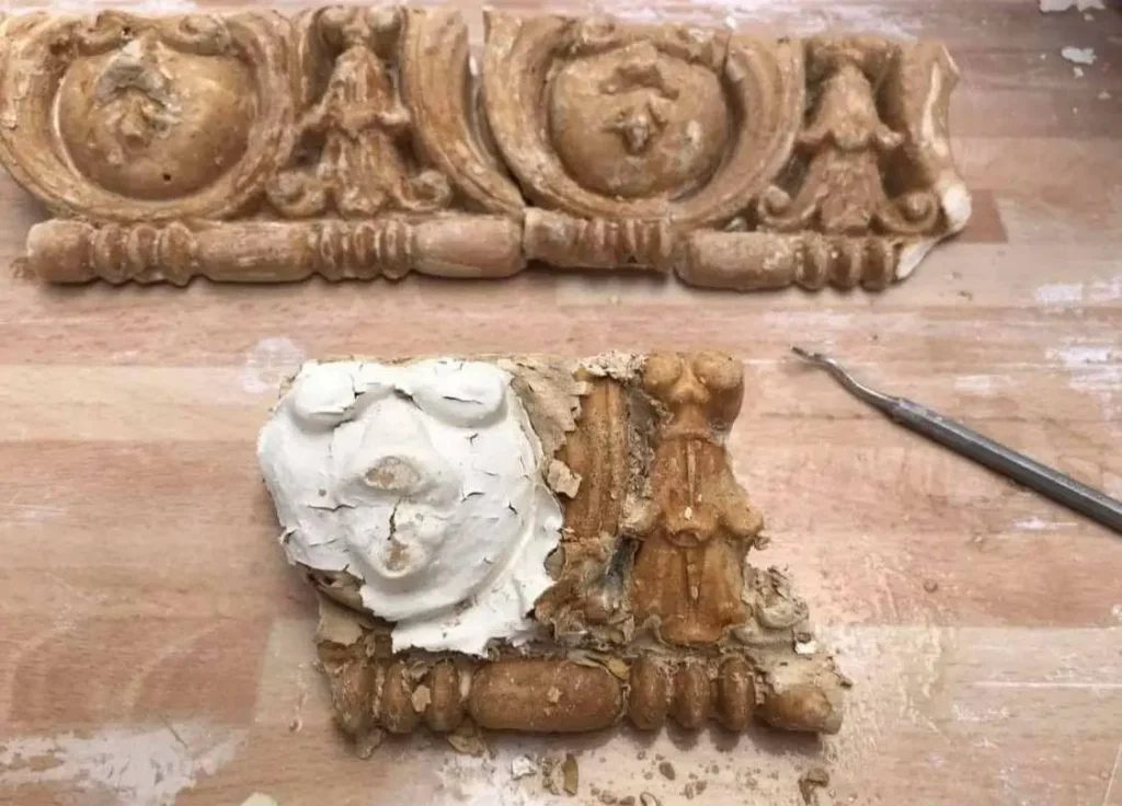 Damaged decorative cornice detail with part-remoulded section – original cornice repairs Glasgow