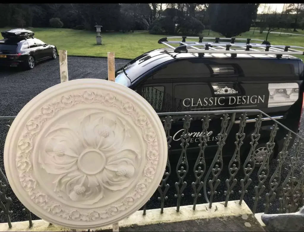 Plaster ceiling rose displayed in front of Classic Design van – plaster ceiling roses Glasgow