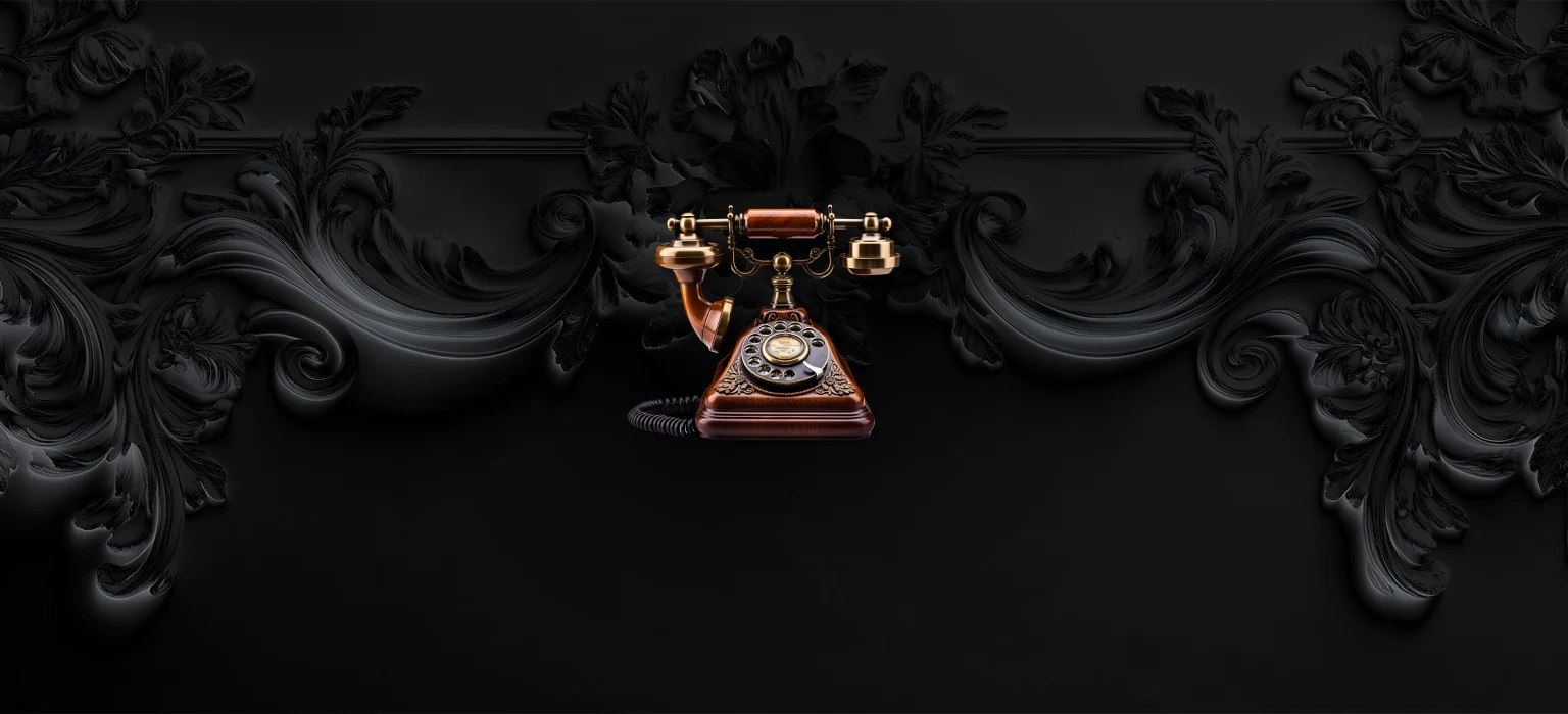Classic rotary phone on dark background to represent contact section – Glasgow cornice services