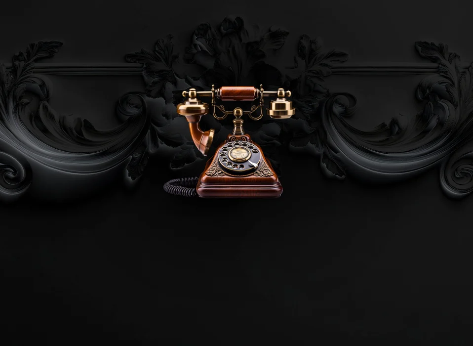 Classic rotary phone on dark background to represent contact section – Glasgow cornice services
